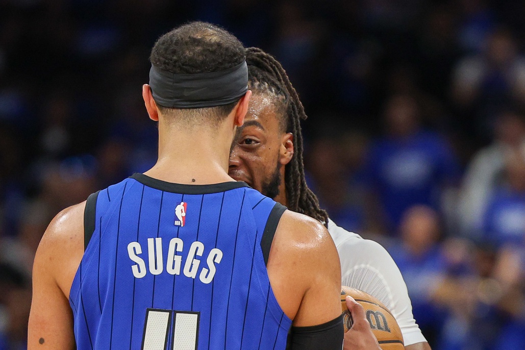 Orlando Magic guard Jalen Suggs (4) and Cleveland Cavaliers guard Darius Garland (10) go head to head in the third quarter during game four of the first round for the 2024 NBA playoffs at Kia Center.