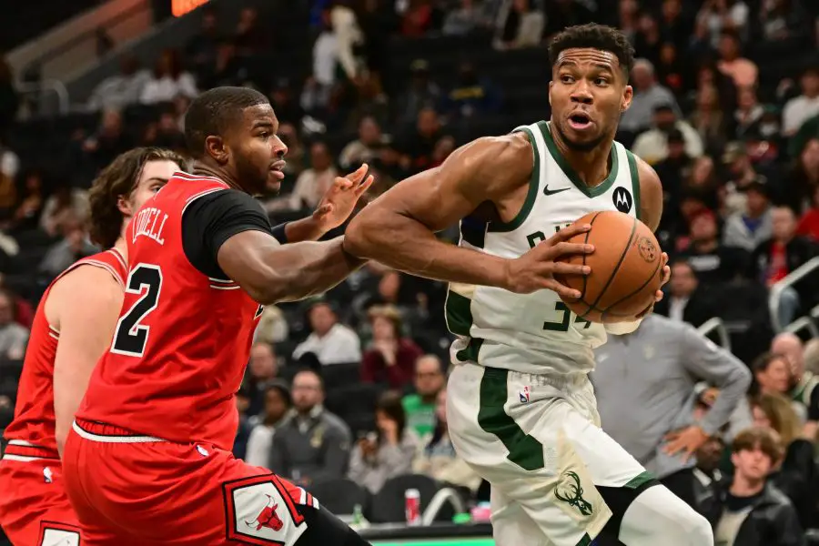 Milwaukee Bucks forward Giannis Antetokounmpo (34) drives past Chicago Bulls forward E.J. Liddell (32) in the third quarter at Fiserv Forum.