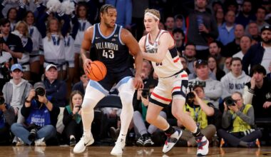 Mar 13, 2025; New York, NY, USA; Villanova Wildcats forward Eric Dixon (43) controls the ball against Connecticut Huskies forward Liam McNeeley (30) during the second half at Madison Square Garden. Mandatory Credit: Brad Penner-Imagn Images