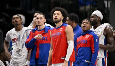 Detroit Pistons guard Cade Cunningham (2) and the Pistons team bench check the replay screen during the first half against the Dallas Mavericks at the American Airlines Cent