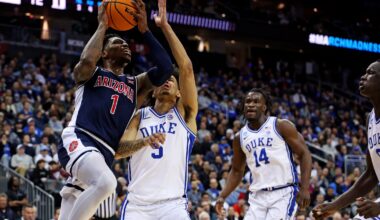 Mar 27, 2025; Newark, NJ, USA; Arizona Wildcats guard Caleb Love (1) shoots the ball against Duke Blue Devils guard Tyrese Proctor (5) during the second half during an East Regional semifinal of the 2025 NCAA tournament at Prudential Center. Mandatory Credit: Vincent Carchietta-Imagn Images