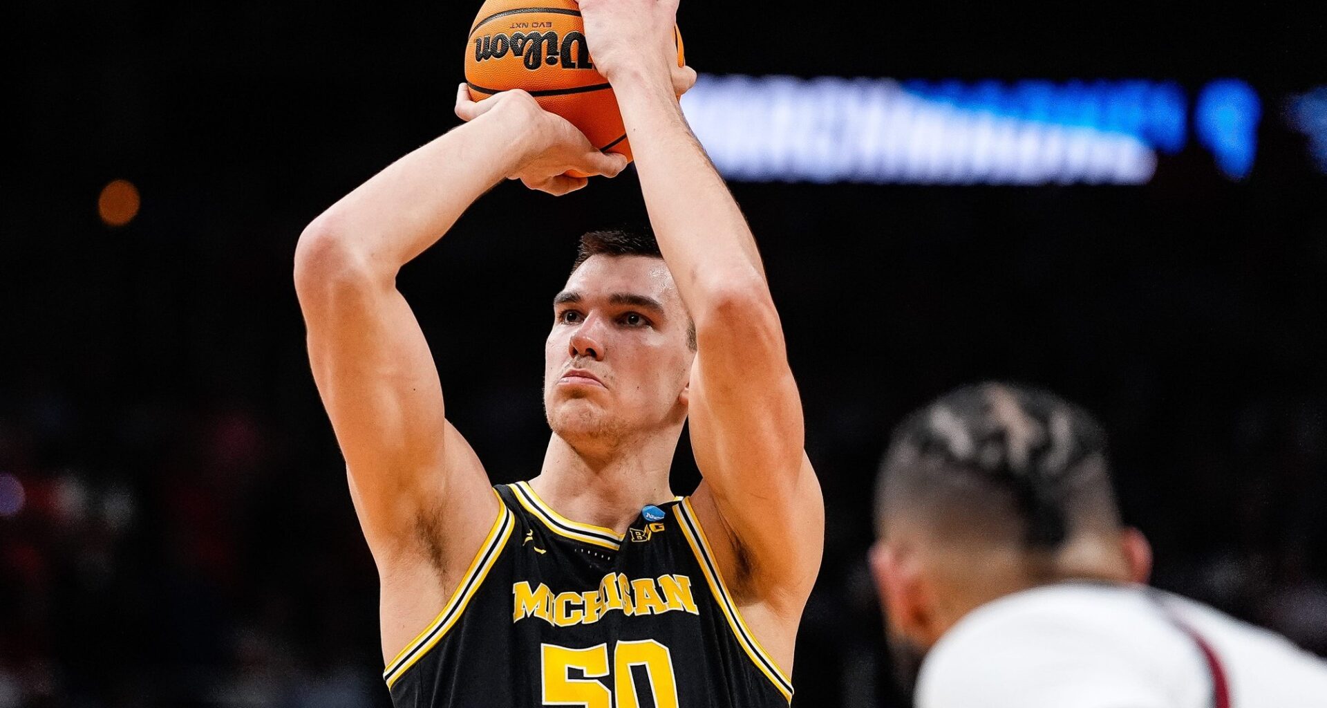 Michigan center Vladislav Goldin (50) attempts a free throw against Auburn during the second half of the Sweet 16 round of NCAA tournament at State Farm Arena in Atlanta, Ga. on Friday, March 28, 2025.