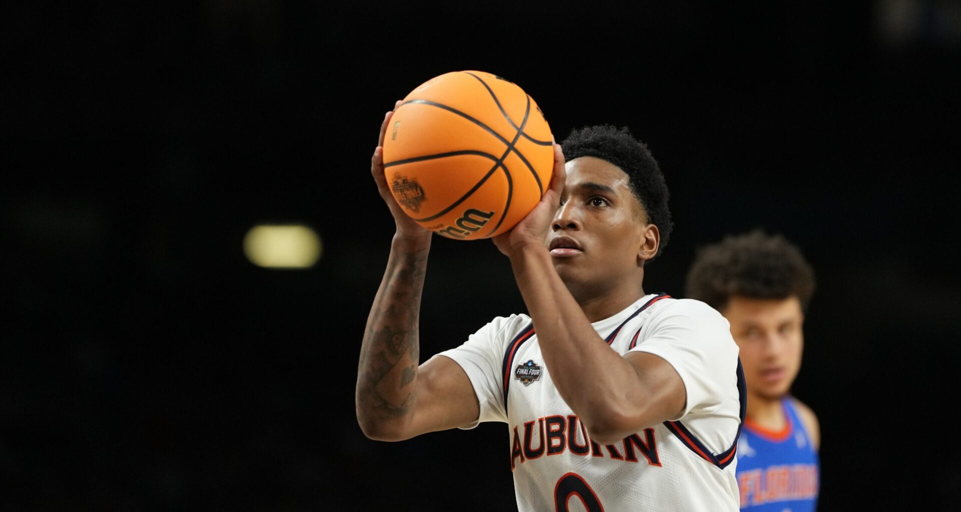 Apr 5, 2025; San Antonio, TX, USA; Auburn Tigers guard Tahaad Pettiford (0) shoots a free throw against the Florida Gators during the first half in the semifinals of the men's Final Four of the 2025 NCAA Tournament at the Alamodome. Mandatory Credit: Bob Donnan-Imagn Images