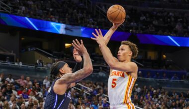 Apr 8, 2025; Orlando, Florida, USA; Atlanta Hawks guard Dyson Daniels (5) shoots the ball over Orlando Magic forward Paolo Banchero (5) during the second quarter at Kia Center. Mandatory Credit: Mike Watters-Imagn Images