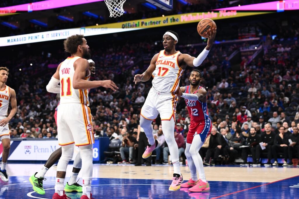 Apr 11, 2025; Philadelphia, Pennsylvania, USA; Atlanta Hawks forward Onyeka Okongwu (17) secures a rebound against the Philadelphia 76ers in the third quarter at Wells Fargo Center. Mandatory Credit: Kyle Ross-Imagn Images