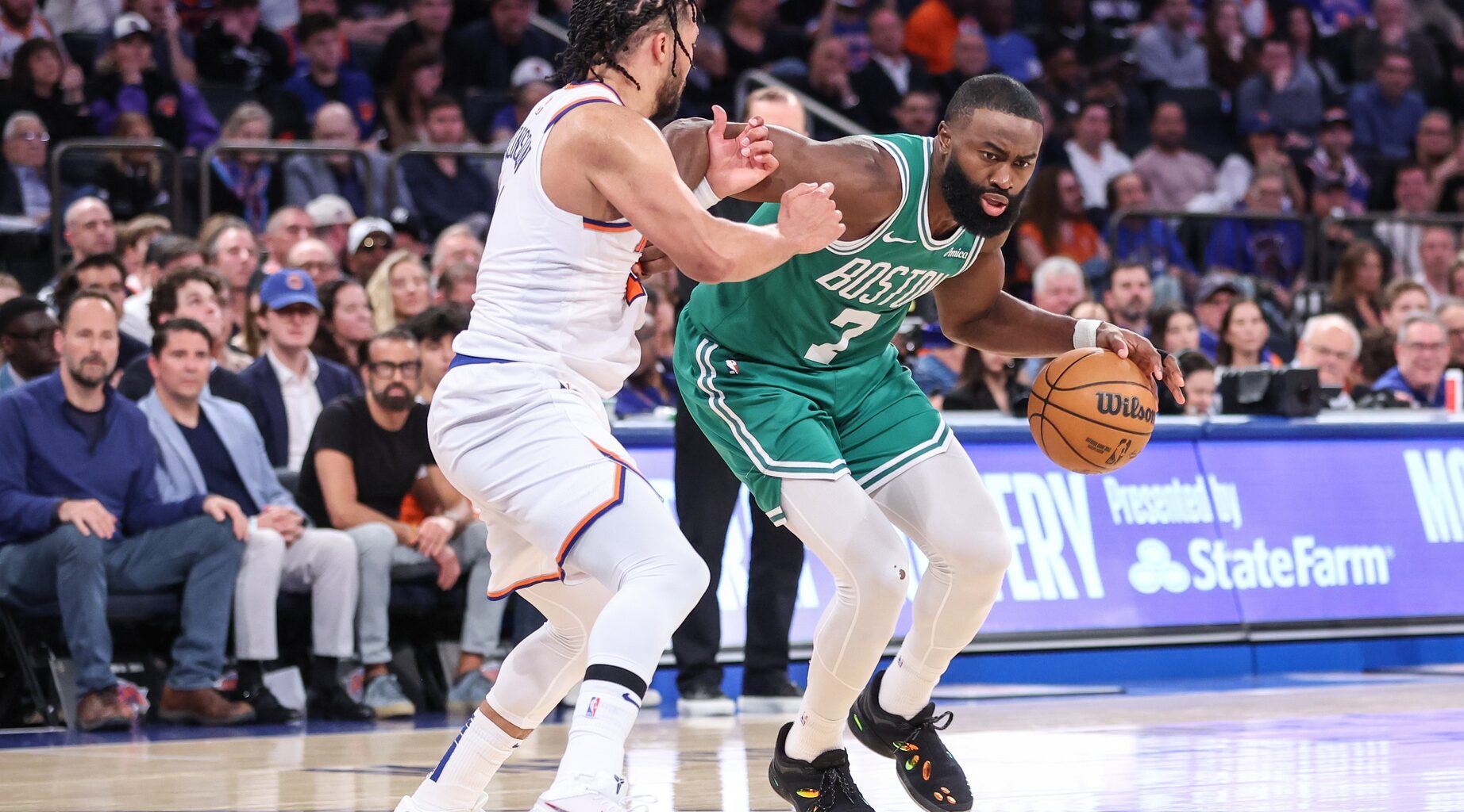 May 10, 2025; New York, New York, USA; Boston Celtics guard Jaylen Brown (7) looks to drive past New York Knicks guard Jalen Brunson (11) in the fourth quarter during game three of the second round for the 2025 NBA Playoffs at Madison Square Garden.