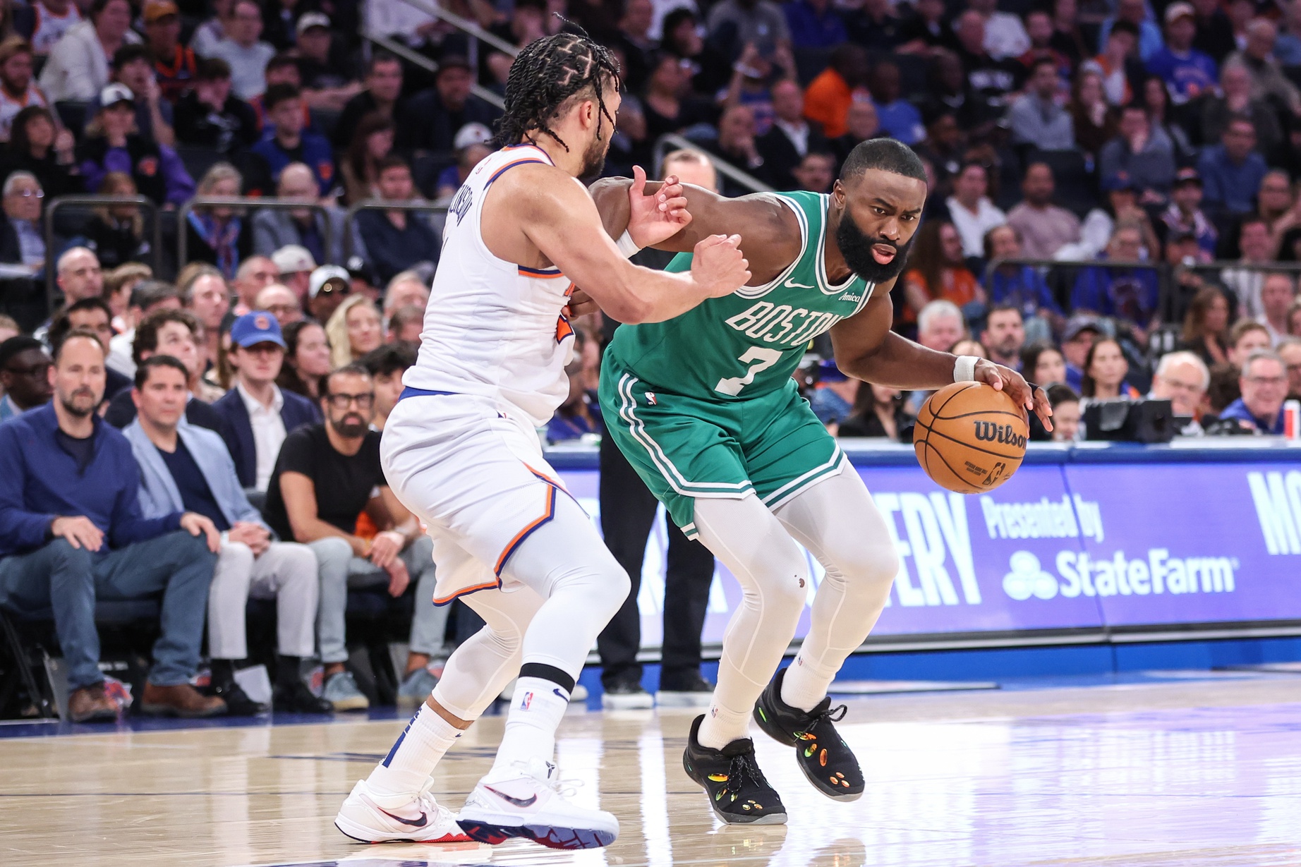 May 10, 2025; New York, New York, USA; Boston Celtics guard Jaylen Brown (7) looks to drive past New York Knicks guard Jalen Brunson (11) in the fourth quarter during game three of the second round for the 2025 NBA Playoffs at Madison Square Garden.