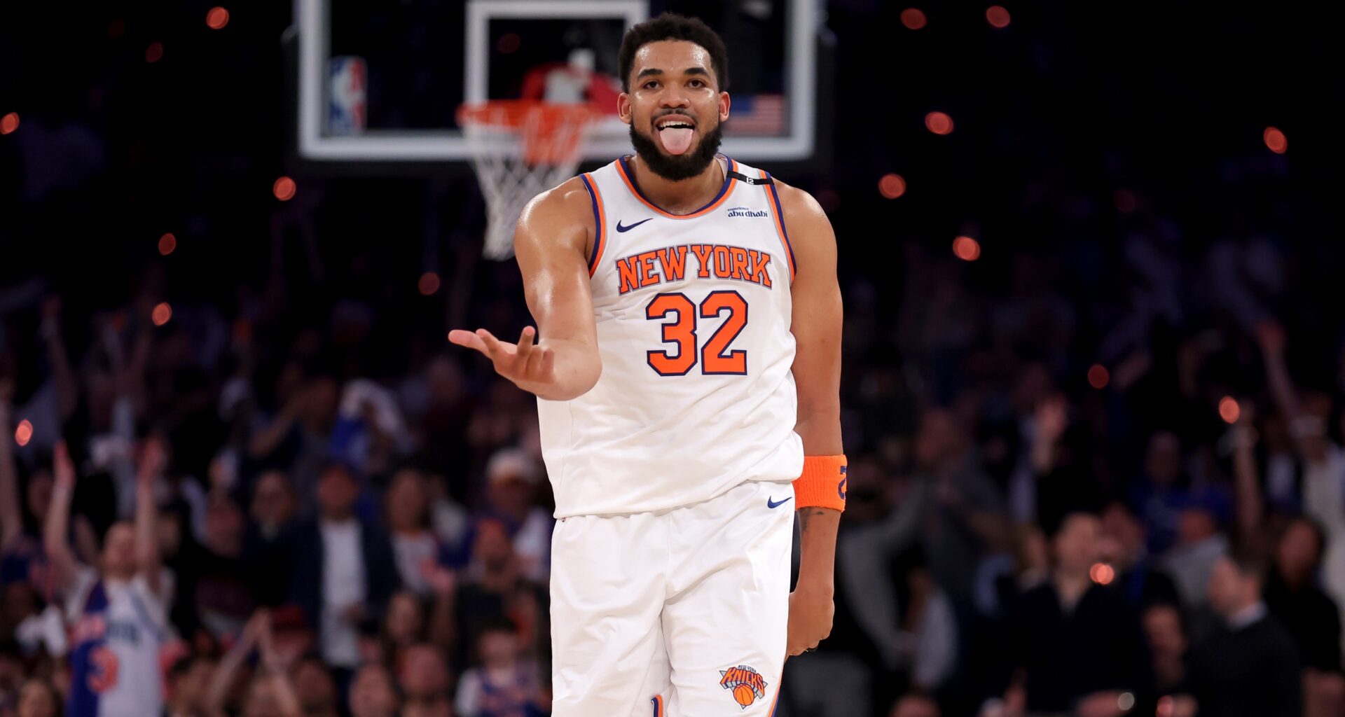 New York Knicks center Karl-Anthony Towns (32) celebrates his three point shot against the Boston Celtics during the first quarter of game six in the second round of the 2025 NBA Playoffs at Madison Square Garden.