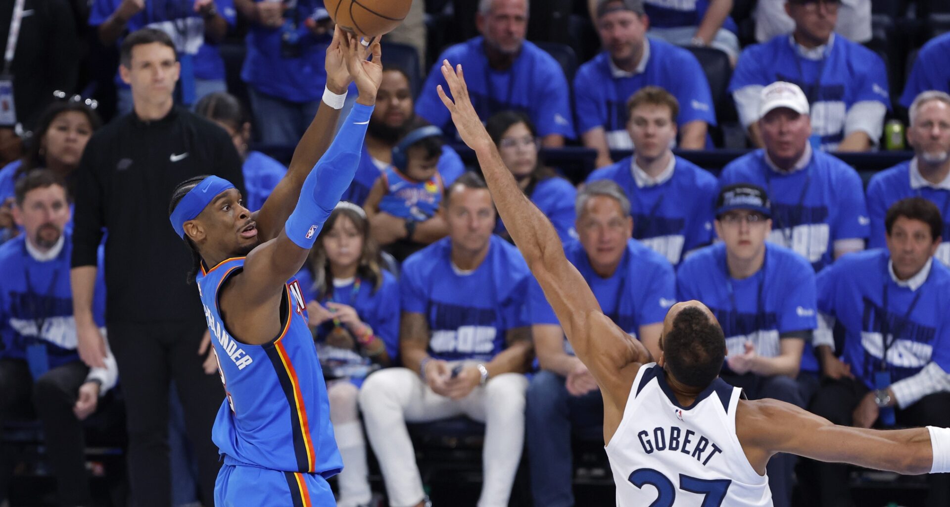 Oklahoma City Thunder guard Shai Gilgeous-Alexander (2) shoots against Minnesota Timberwolves center Rudy Gobert (27) in the fourth quarter during game two of the western conference finals for the 2025 NBA Playoffs at Paycom Center.