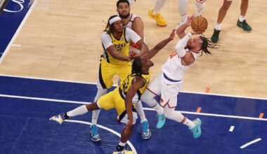 New York Knicks guard Jalen Brunson (11) shoots against Indiana Pacers forward Aaron Nesmith (23) in the fourth quarter during game two of the eastern conference finals for the 2025 NBA Playoffs at Madison Square Garden.