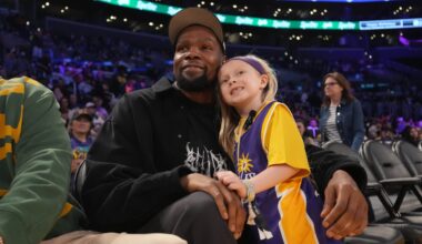May 23, 2025; Los Angeles, California, USA; Kevin Durant poses with 8-year-old LA Sparks fan Vivian Havens during the game against the Golden State Valkyries at Crypto.com Arena.