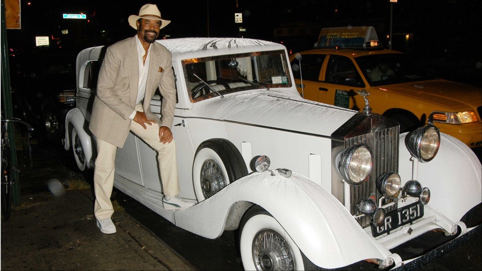 Frazier is still as 'fly' as ever, and is suited and booted as a broadcaster