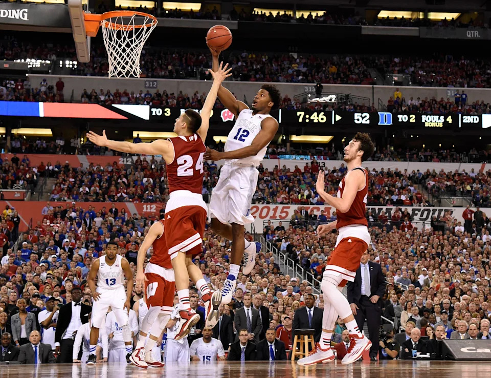 Duke Blue Devils forward Justise Winslow lays the ball up over Wisconsin Badgers guard Bronson Koenig. Robert Deutsch-USA TODAY Sports