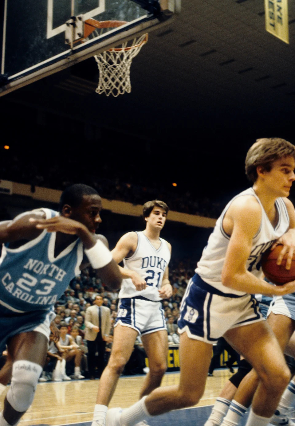 North Carolina Tar Heels guard Michael Jordan (23) in action against Duke Blue Devils forward Mark Alarie (32) during the ACC tournament at Greensboro Coliseum.