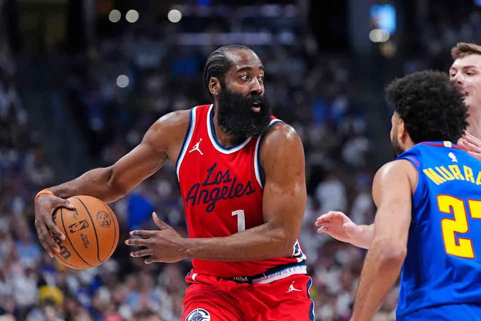 LA Clippers guard James Harden prepares to pass the ball in the second quarter against the Denver Nuggets during Game 7 of first round for the 2025 NBA Playoffs at Ball Arena.