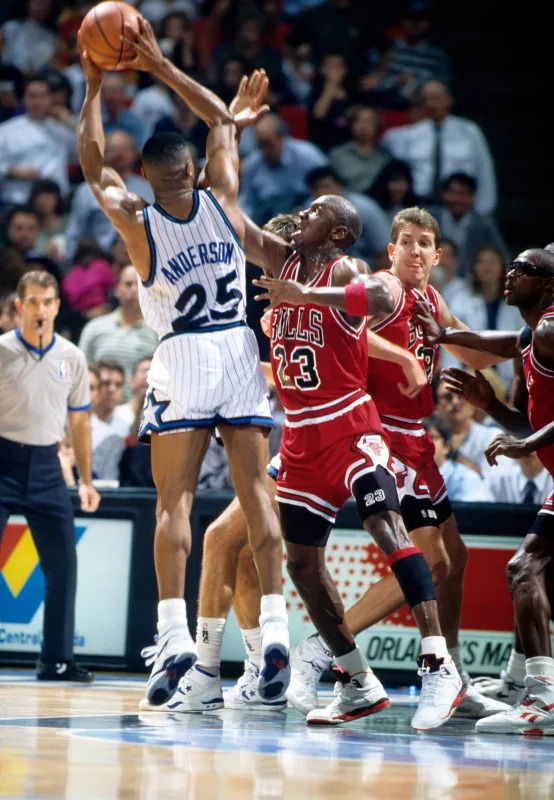 Chicago Bulls guard Michael Jordan (23) defends against Orlando Magic guard Nick Anderson (25)Mandatory Credit&colon; Imagn Images