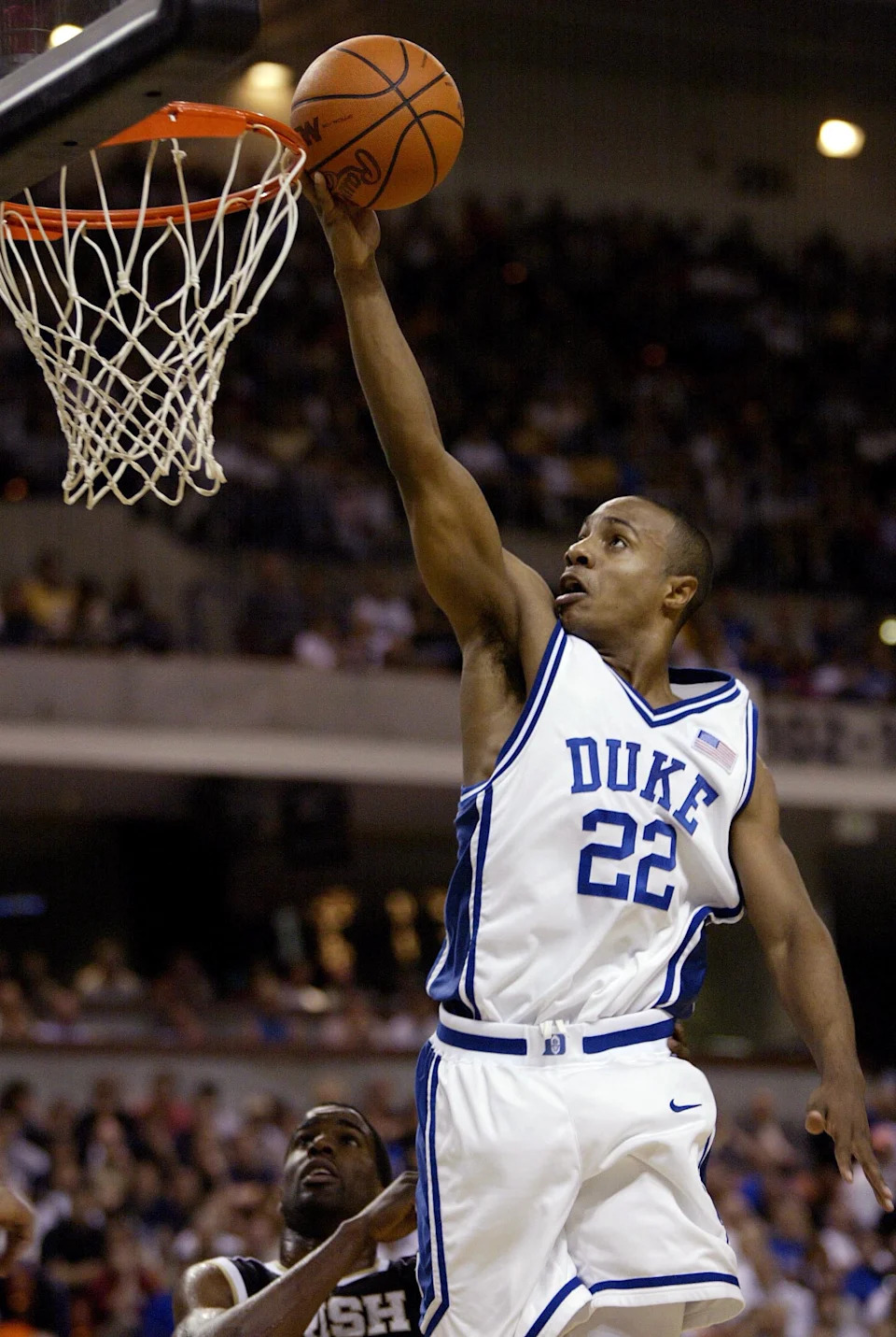 Jay Williams of Duke drives to the basket during a game with Notre Dame.