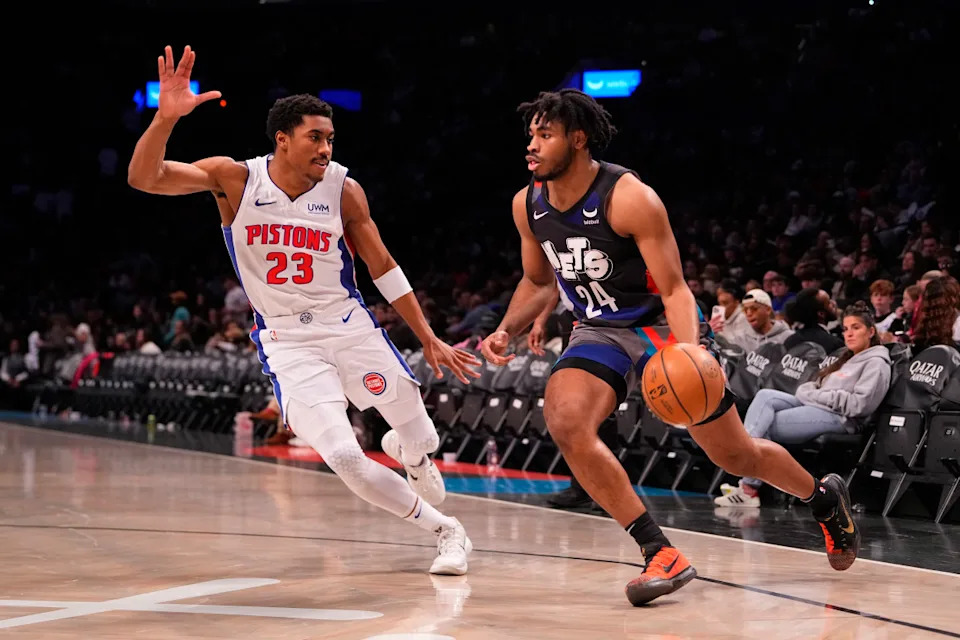 Brooklyn Nets shooting guard Cam Thomas (24) dribbles the ball against Detroit Pistons point guard Jaden Ivey (23)© Gregory Fisher-Imagn Images
