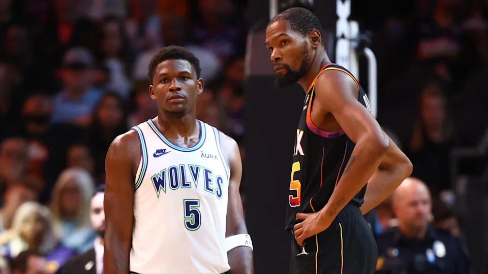 Minnesota Timberwolves guard Anthony Edwards (5) against Phoenix Suns forward Kevin Durant (35).Mark J. Rebilas-Imagn Images