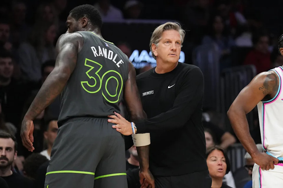 Minnesota Timberwolves head coach Chris Finch greets forward Julius Randle (30) as he goes to the bench during the first half against the Miami Heat at Kaseya Center.© Jim Rassol-Imagn Images