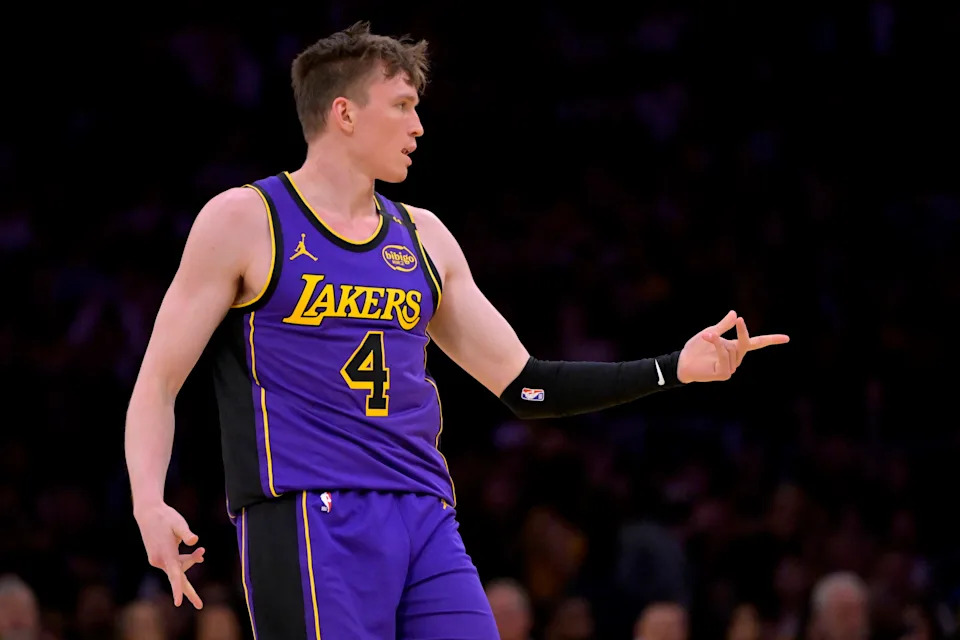 Apr 4, 2025; Los Angeles, California, USA; Los Angeles Lakers guard Dalton Knecht (4) reacts after a 3-point basket in the first half against the New Orleans Pelicans at Crypto.com Arena. Mandatory Credit: Jayne Kamin-Oncea-Imagn Images