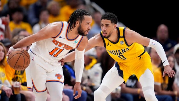 FILE - New York Knicks guard Jalen Brunson (11) drives past Indiana Pacers guard Tyrese Haliburton (0) during the second half of Game 3 in an NBA basketball second-round playoff series, Friday, May 10, 2024, in Indianapolis. (AP Photo/Michael Conroy, File)