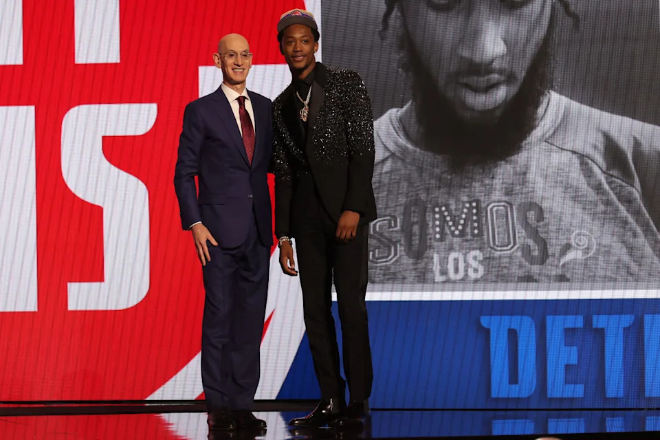 Jun 26, 2024; Brooklyn, NY, USA; Ron Holland II poses for photos with NBA commissioner Adam Silver after being selected in the first round by the Detroit Pistons in the 2024 NBA Draft at Barclays Center.© Brad Penner-Imagn Images