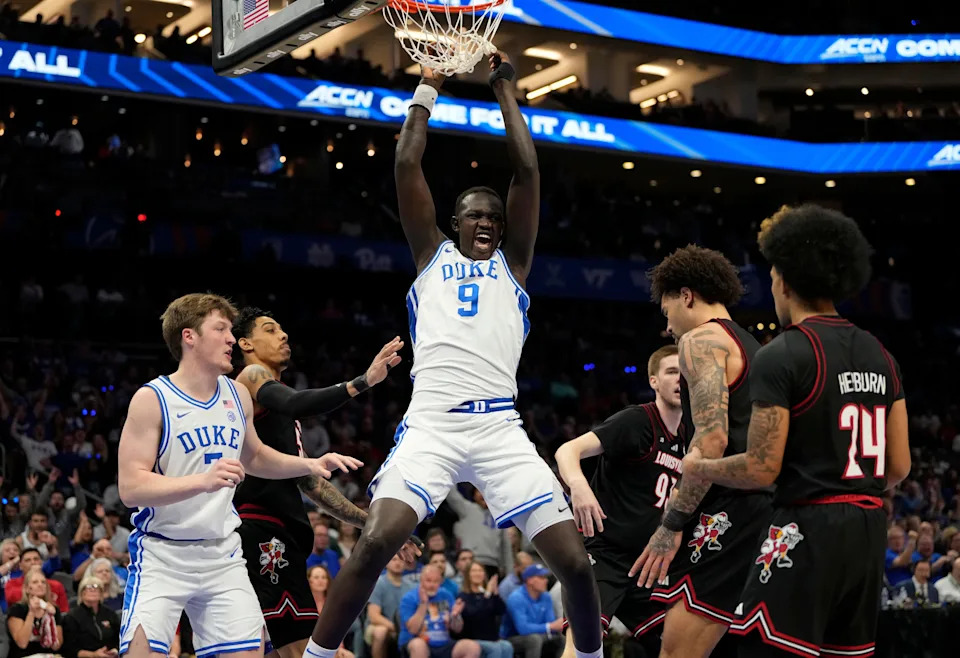 Mar 15, 2025; Charlotte, NC, USA; Duke Blue Devils center Khaman Maluach (9) reacts after a play in the first half of the 2025 ACC Conference Championship game against the Louisville Cardinals at Spectrum Center. Mandatory Credit: Bob Donnan-Imagn Images