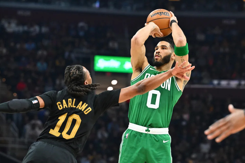 CLEVELAND, OHIO - FEBRUARY 04: Jayson Tatum #0 of the Boston Celtics shoots over Darius Garland #10 of the Cleveland Cavaliers during the second quarter at Rocket Mortgage Fieldhouse on February 04, 2025 in Cleveland, Ohio. NOTE TO USER: User expressly acknowledges and agrees that, by downloading and or using this photograph, User is consenting to the terms and conditions of the Getty Images License Agreement. (Photo by Jason Miller/Getty Images)