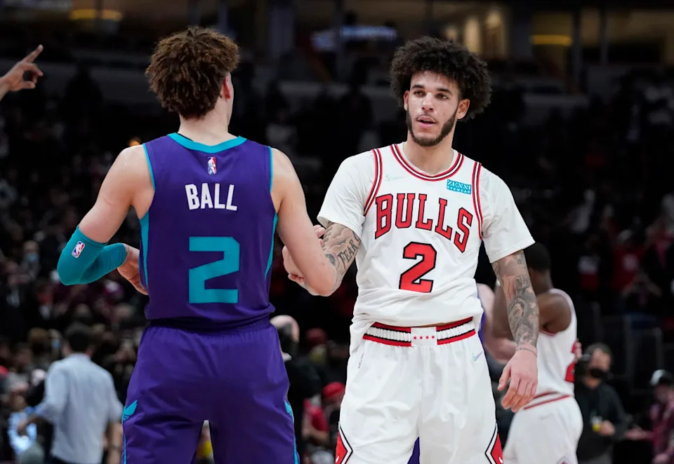 Charlotte Hornets guard LaMelo Ball (2) and Chicago Bulls guard Lonzo Ball (2) hug after the game at United Center.David Banks-Imagn Images