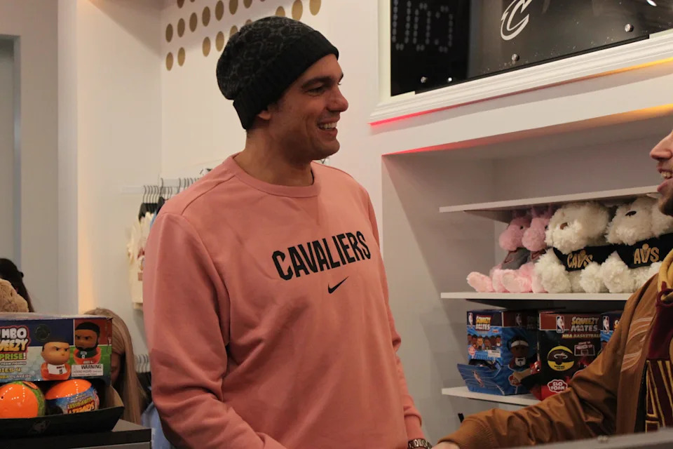 Cleveland Cavaliers legend Anderson Varejão could be found roaming throughout Center Court, the new and first team shop outside of Rocket Arena, and greeting fans at its recent grand opening.