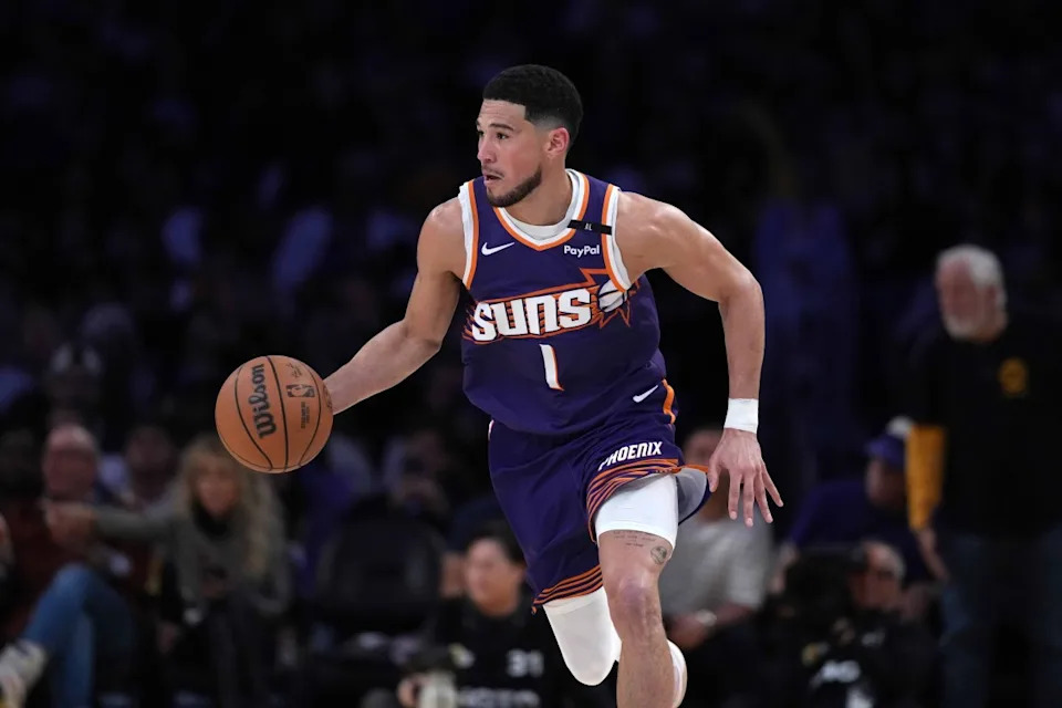 Phoenix Suns guard Devin Booker (1) dribbles the ball against the Los Angeles Lakers in the second half at Crypto.com Arena. Mandatory Credit: Kirby Lee-Imagn ImagesCredit&colon; Kirby Lee-Imagn Images