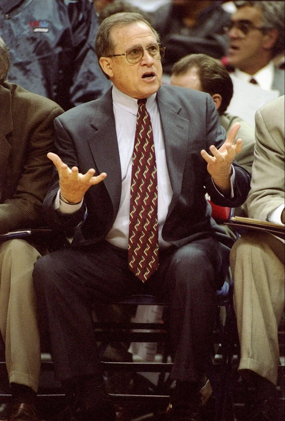13 Dec 1996: Denver Nuggets assistant coach Dick Motta looks on during a game against the Washington Bullets at the USAir Arena in Landover, Maryland. The Bullets won the game, 108-104.