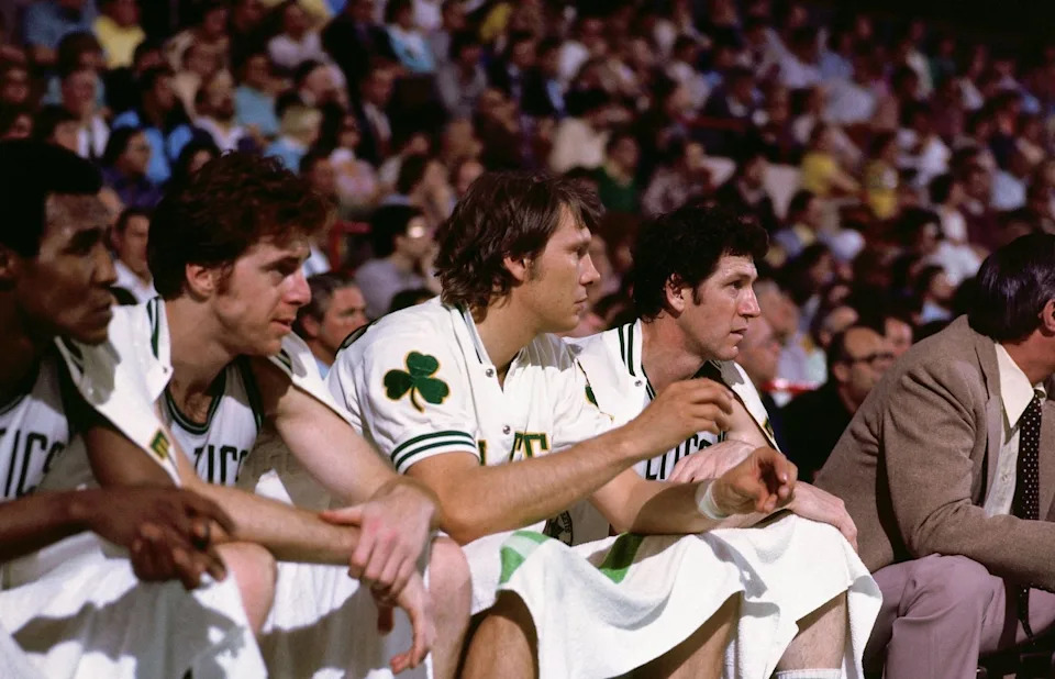 BOSTON - 1976: (L-R) Dave Cowens #18, Don Nelson #19 and John Havlicek #17 of the Boston Celtics sit on the bench during a game in the 1976 NBA Finals at the Boston Garden in Boston, Massachusetts. The Boston Celtics defeated the Phoenix Suns 4-2 and won the the 1976 NBA Championship. NOTE TO USER: User expressly acknowledges and agrees that, by downloading and or using this photograph, User is consenting to the terms and conditions of the Getty Images License Agreement. Mandatory Copyright Notice: Copyright 1976 NBAE (Photo by Dick Raphael/NBAE via Getty Images)