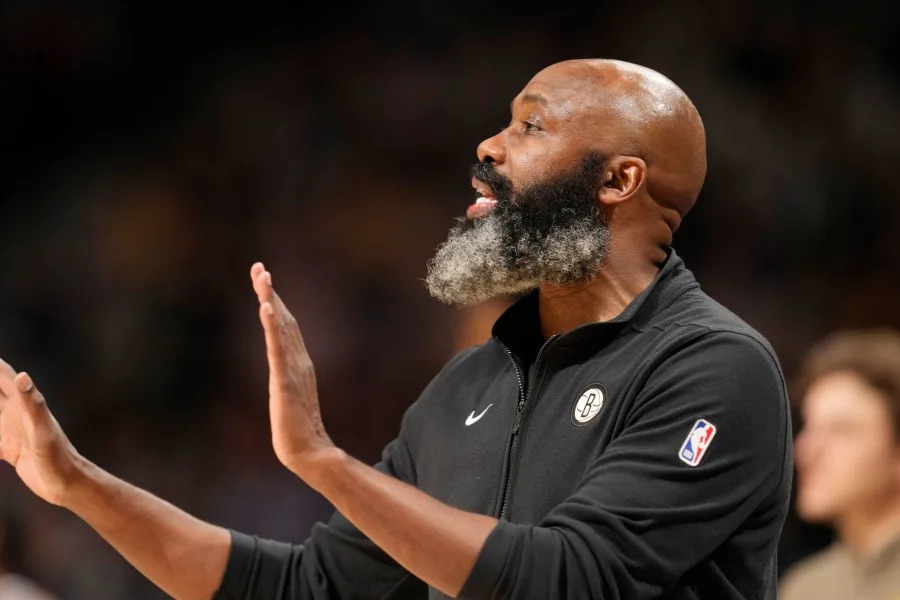 Brooklyn Nets head coach Jacque Vaughn directs players against the Denver Nuggets during the first half of an NBA basketball game Thursday, Dec. 14, 2023, in Denver. (AP Photo/David Zalubowski)