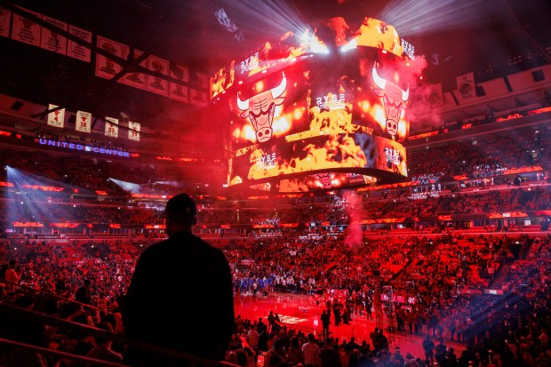 Fans watch Bulls player introductions before the season opener against the Oklahoma City Thunder on Oct. 25, 2023, at the United Center. (Armando L. Sanchez/Chicago Tribune)