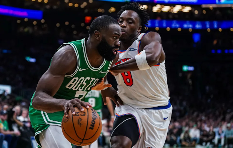 May 7, 2025; Boston, Massachusetts, USA; Boston Celtics guard Jaylen Brown (7) drives the ball against New York Knicks forward OG Anunoby (8) in the second half during game two of the second round for the 2025 NBA Playoffs at TD Garden. Mandatory Credit: David Butler II-Imagn Images