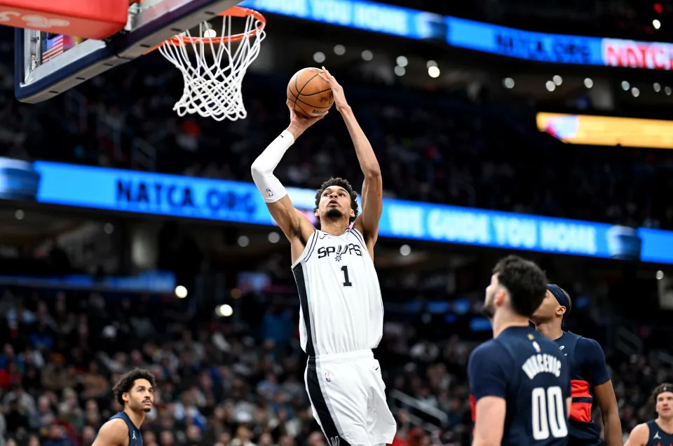 WASHINGTON, DC - FEBRUARY 10: Victor Wembanyama #1 of the San Antonio Spurs dunks the ball in the second quarter against the Washington Wizards at Capital One Arena on February 10, 2025 in Washington, DC. NOTE TO USER: User expressly acknowledges and agrees that, by downloading and or using this photograph, User is consenting to the terms and conditions of the Getty Images License Agreement. (Photo by Greg Fiume/Getty Images)