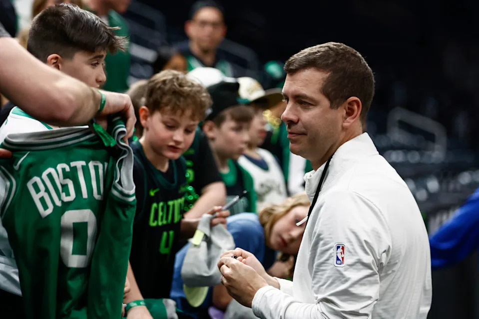 Apr 23, 2025; Boston, Massachusetts, USA; Brad Stevens, president of basketball operations signs autographs before game 2 of first round of the 2024 NBA Playoffs against the Orlando Magic at TD Garden. Mandatory Credit: Winslow Townson-Imagn Images