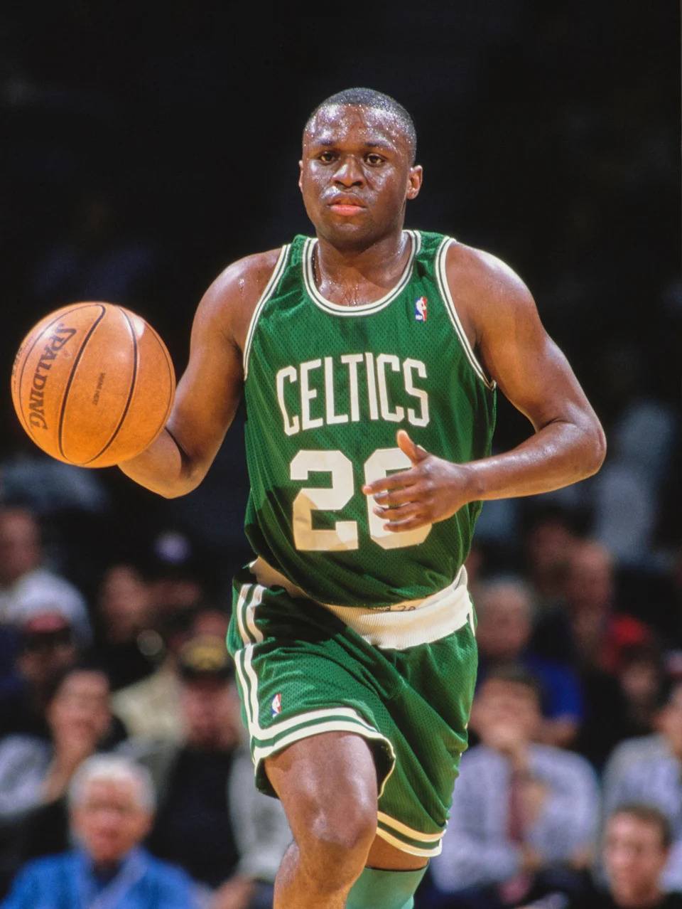 Sherman Douglas #20, Point Guard for the Boston Celtics dribbles the basketball during the NBA Atlantic Division basketball game against the Miami Heat on 18th January 1995 at the Miami Arena in Miami, Florida. The Miami Heat won the game 121 - 93. (Photo by Allsport/Getty Images)