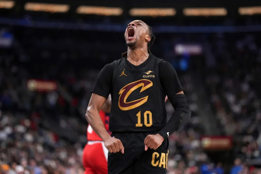 Cleveland Cavaliers guard Darius Garland celebrates after scoring during the second half of an NBA basketball game against the Los Angeles Clippers, Tuesday, March 18, 2025, in Inglewood, Calif. (AP Photo/Mark J. Terrill)