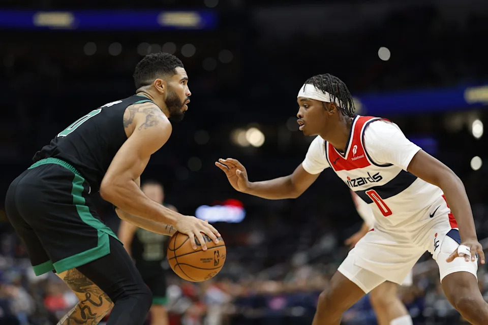 Oct 24, 2024; Washington, District of Columbia, USA; Boston Celtics forward Jayson Tatum (0) prepares to shoot the ball as Washington Wizards guard Bilal Coulibaly (0) defends in the first half at Capital One Arena. Mandatory Credit: Geoff Burke-Imagn Images
