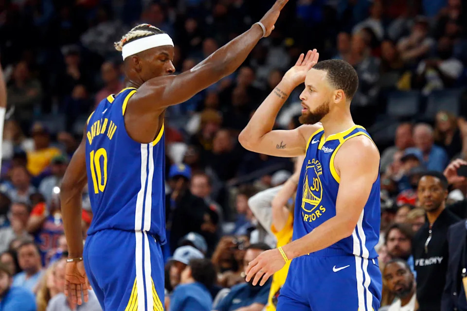 Golden State Warriors forward Jimmy Butler III (10) and guard Steph Curry (30).Petre Thomas-Imagn Images