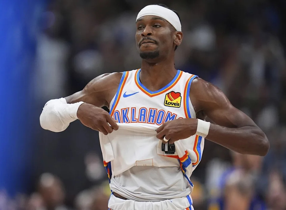 Shai Gilgeous-Alexander dejectedly walks off the court after the Thunder’s Game 3 overtime loss to the Nuggets. AP