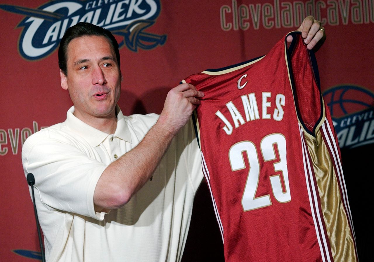 Cleveland Cavaliers General Manager Jim Paxson holds up the No. 23 jersey with LeBron James' name on the back during an NBA basketball news conference at Gund Arena in Cleveland Friday, May 23, 2003.