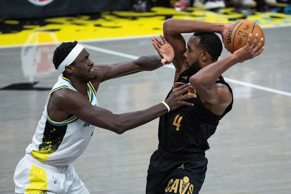 Cleveland Cavaliers forward Evan Mobley (4) holds the ball as Indiana Pacers forward Pascal Siakam (43) defends during Game 3 of a second-round playoff series on May 9, 2025, in Indianapolis, Indiana.