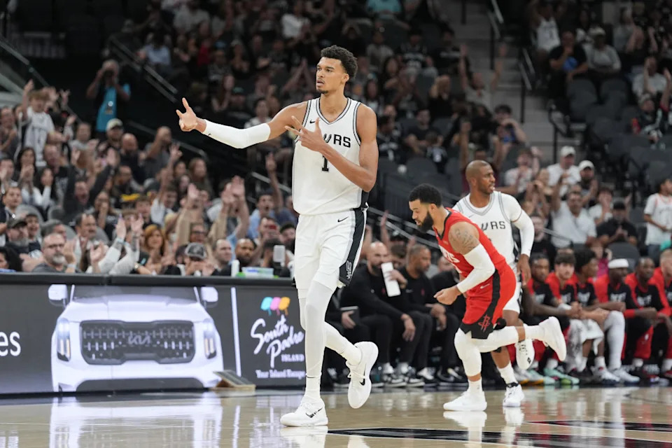 Oct 26, 2024; San Antonio, Texas, USA; San Antonio Spurs center Victor Wembanyama (1) celebrates a three-point shot in the first half against the Houston Rockets at Frost Bank Center.© Daniel Dunn-Imagn Images