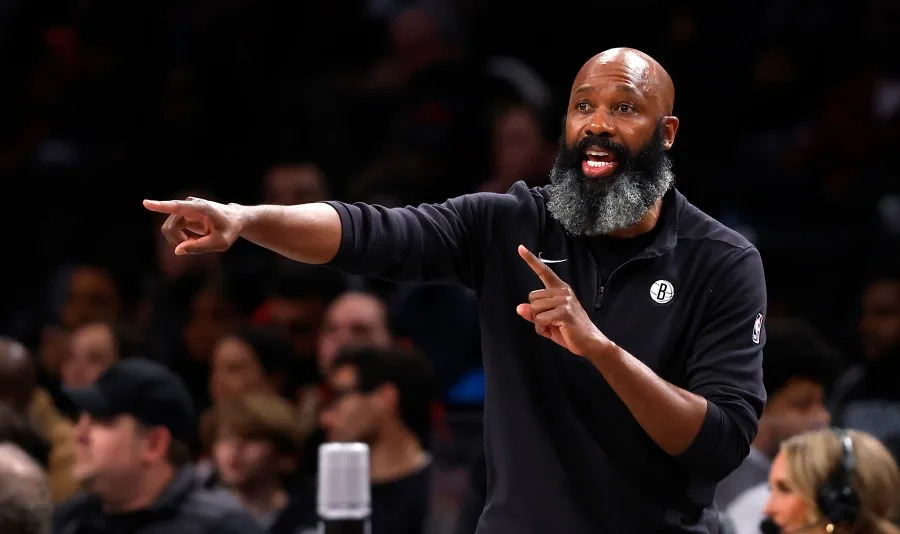 FILE – Brooklyn Nets head coach Jacque Vaughn instructs his players against the Detroit Pistons during the second half of an NBA basketball game, Saturday, Dec. 23, 2023, in New York. The Brooklyn Nets fired Jacque Vaughn on Monday, Feb. 19, 2024, after ending a disappointing first half of the season with a 50-point loss in Boston in their final game before the All-Star break. About a year after giving Vaughn a contract extension, the Nets changed course and said an interim coach would be named soon.(AP Photo/Noah K. Murray, File)