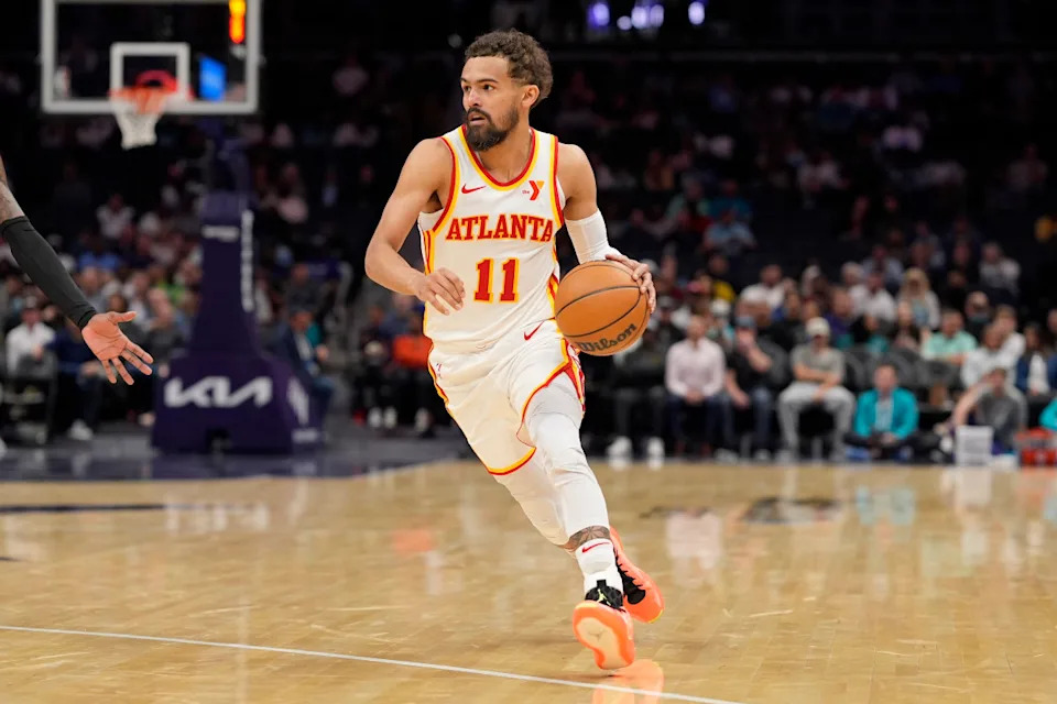 Mar 18, 2025; Charlotte, North Carolina, USA; Atlanta Hawks guard Trae Young (11) brings the ball up court against the Charlotte Hornets during second quarter at Spectrum Center. Mandatory Credit: Jim Dedmon-Imagn Images Mandatory Credit: Jim Dedmon-Imagn Images