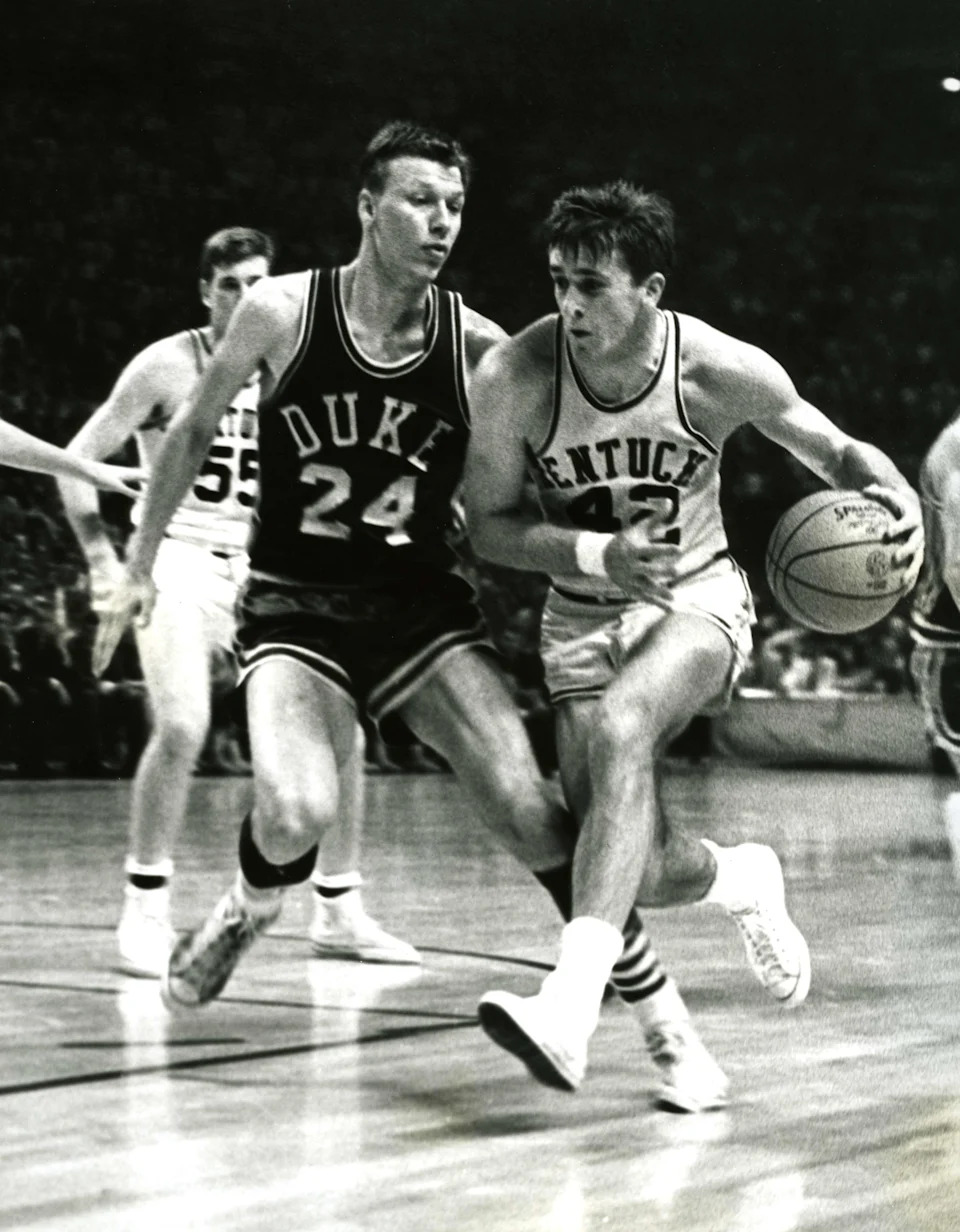 Kentucky Wildcats guard Pat Riley drives against Duke Blue Devils guard Jack Marin (24) during the 1966 Final Four at Cole Fieldhouse.